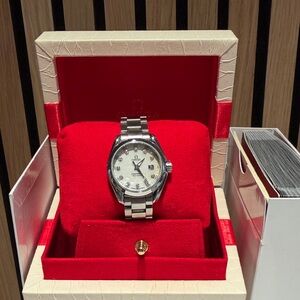 Omega Silver Women's Watch with Diamond Accents